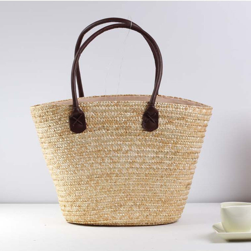 Braided beach bag with colorful embroidery pattern Kalsten