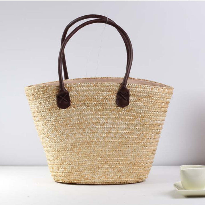 Braided beach bag with colorful embroidery pattern Kalsten