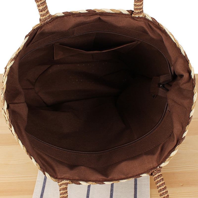 Summer wicker handbag with pom poms Kalsten
