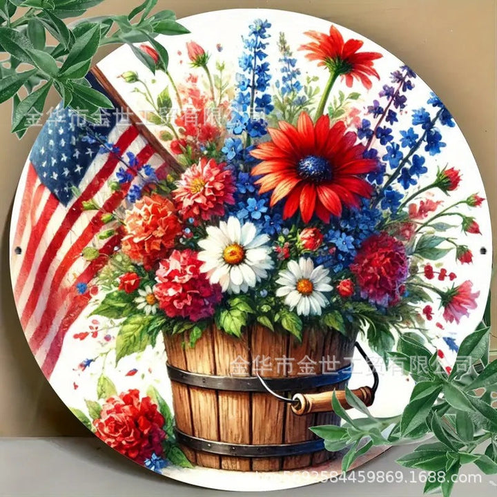 Independence Day rustic round wooden patriotic cross wall plaque with floral accents and God Bless America banner Kalsten