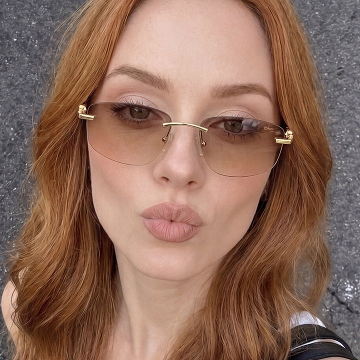 Ladies elegant semi-rimless glasses with luxurious metal frame and transparent lenses Kalsten
