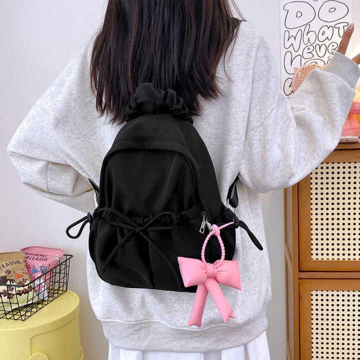 Fashionable backpack with playful details Kalsten