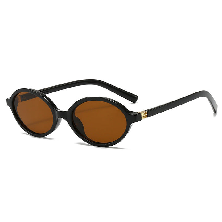 Women's fashionable oval glasses with golden accents Kalsten