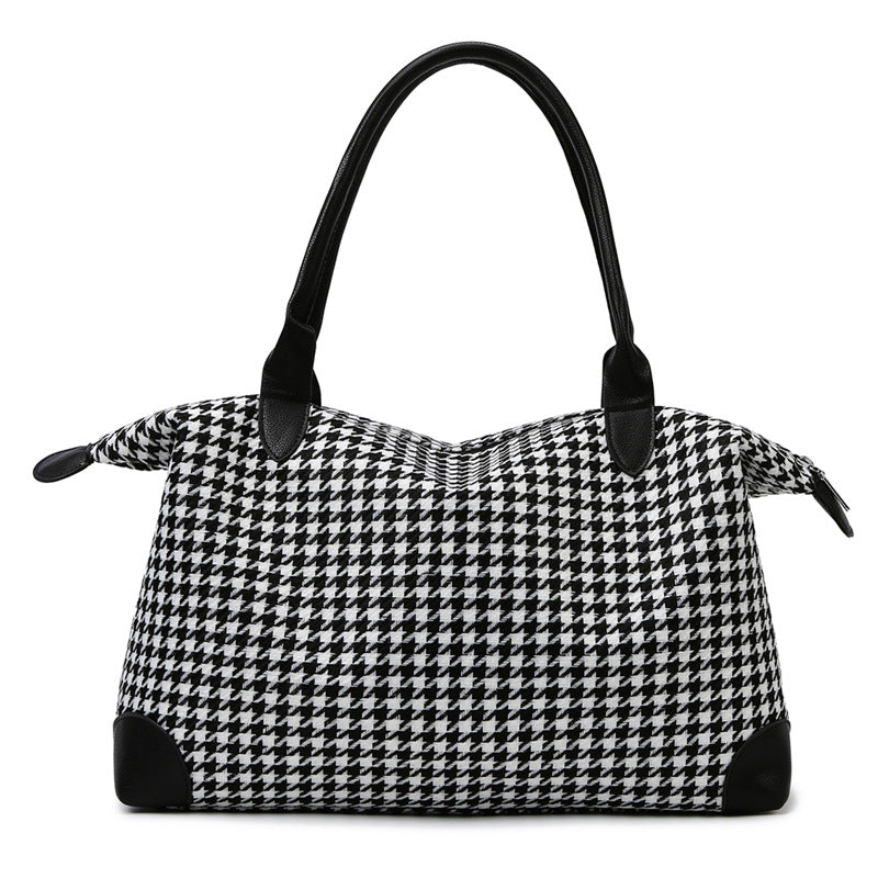 Fashionable handbag in timeless houndstooth pattern Kalsten