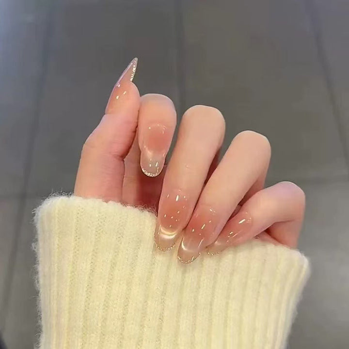Artificial nails in elegant French manicure design Kalsten