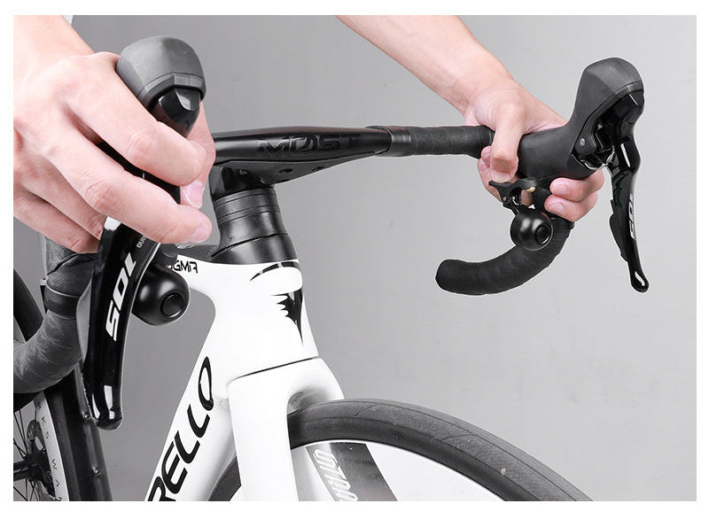 compact bicycle handlebar bell with quick release clamp and ergonomic thumb lever Kalsten