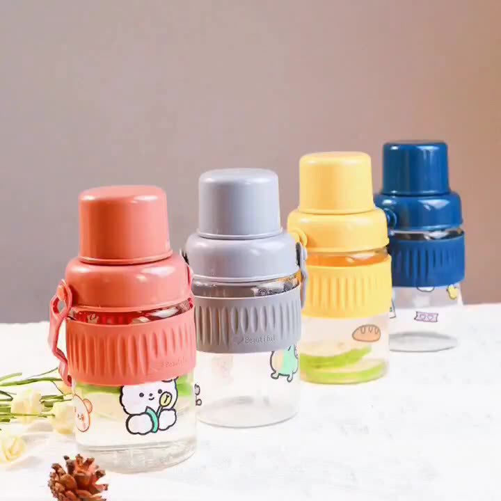 Ladies trendy glass drinking bottle with practical silicone protection Kalsten