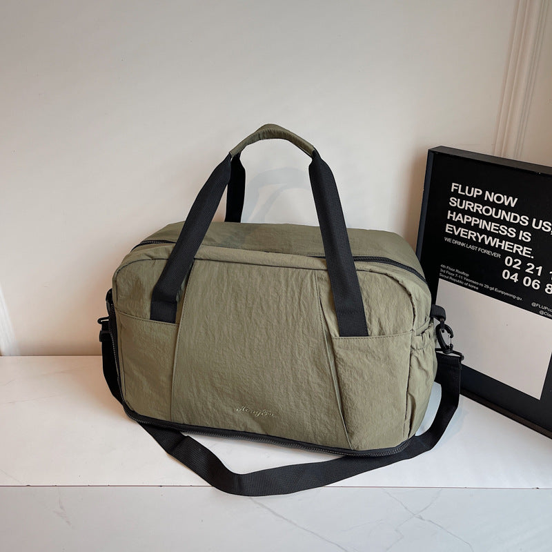 Sporty travel bag with practical outer pockets Kalsten