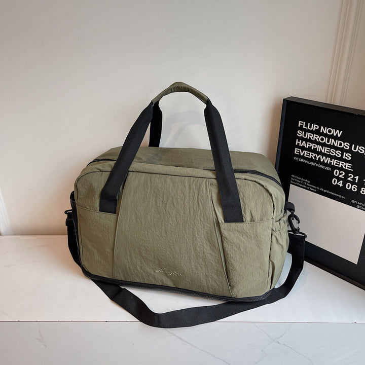 Sporty travel bag with practical outer pockets Kalsten