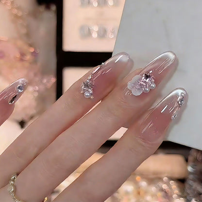 Nail art set with glamorous 3D applications and elegant floral decorations Acalora