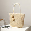 Handmade straw bag with pompom details Kalsten
