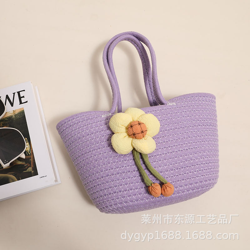 Handcrafted basket bag with floral accents Kalsten