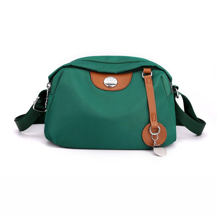 Shoulder bag with adjustable shoulder strap and clear compartment system Kalsten