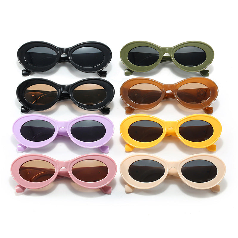 Women's fashionable sunglasses with oval frame and golden applications Kalsten