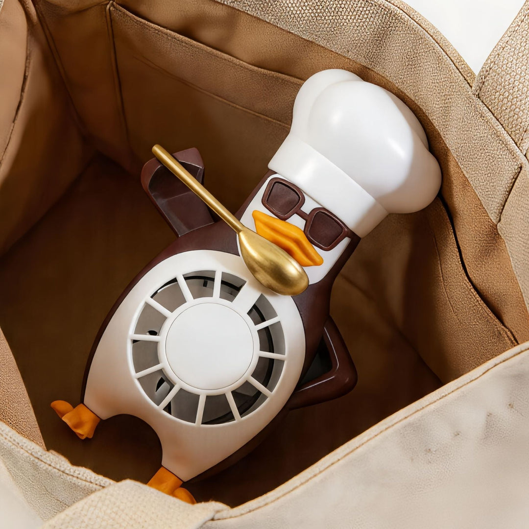 Ladies table fan in modern penguin design Kalsten
