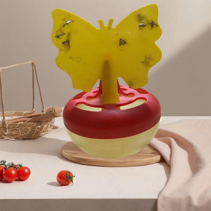 Butterfly-shaped sticky insect trap with refillable liquid reservoir and reusable base Kalsten
