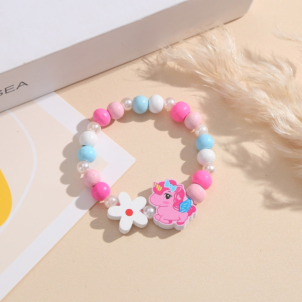 Playful children's bracelet with unicorn and flower motif Kalsten