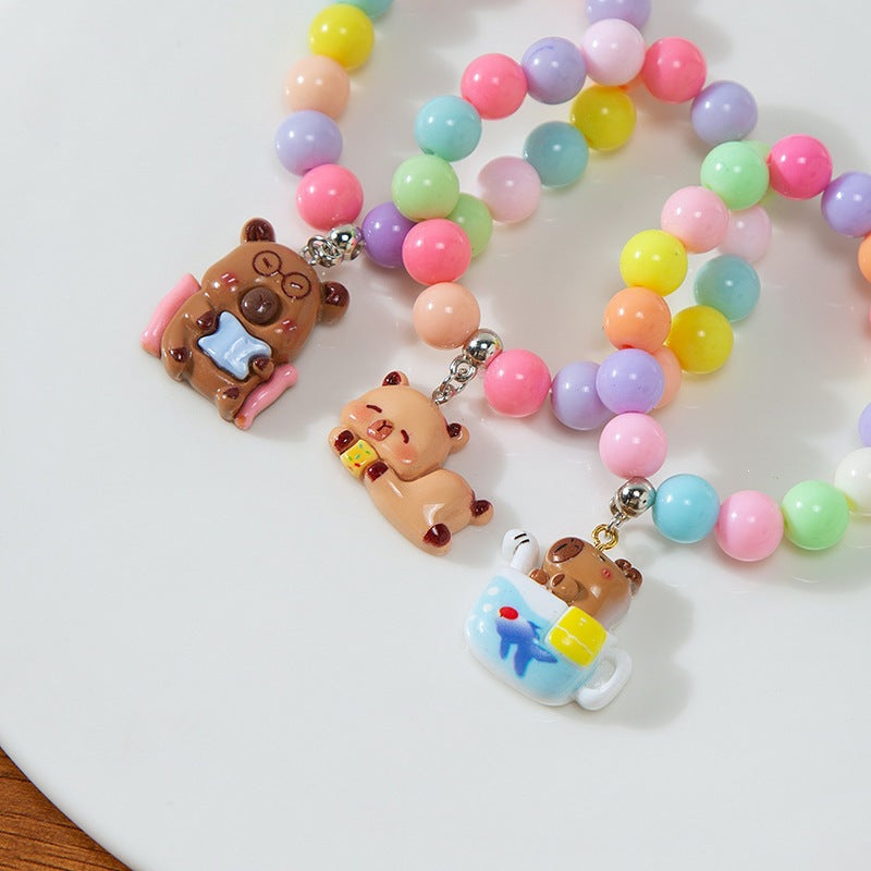 Colorful children's bracelet with crafted pendant Kalsten