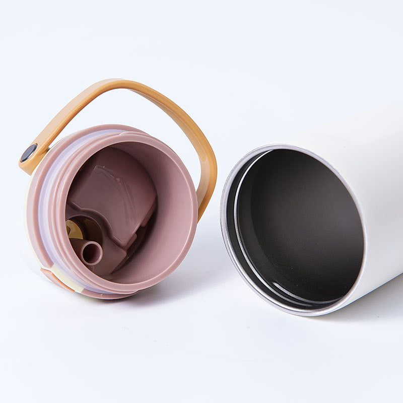Unisex double-walled vacuum drinking bottle made of stainless steel with one-handed click closure and carrying handle Kalsten