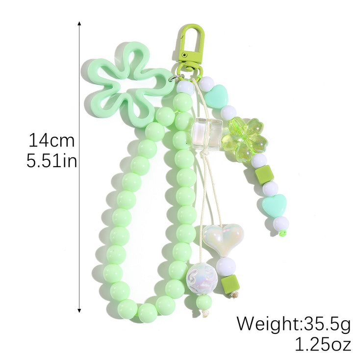 Playful keychain with flower and butterfly details Kalsten