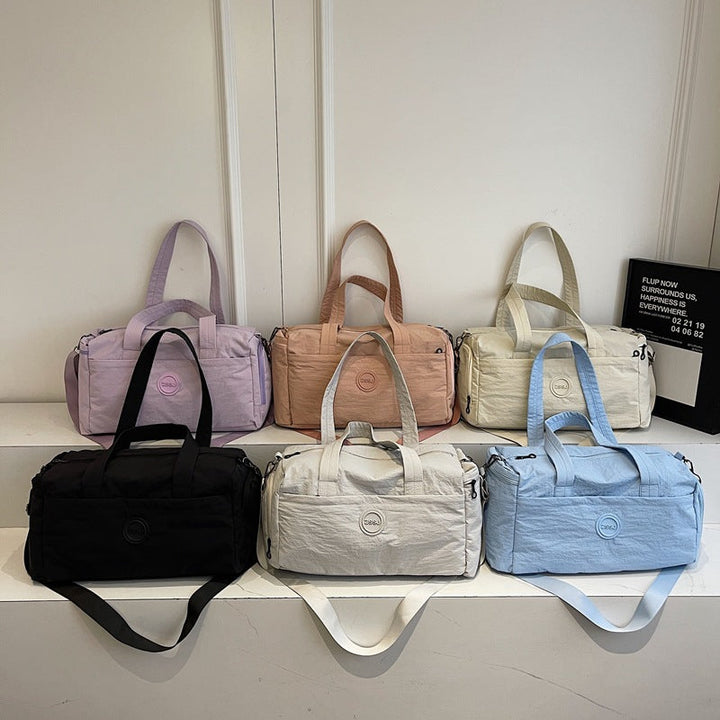 Sporty travel bag with practical exterior pockets Kalsten