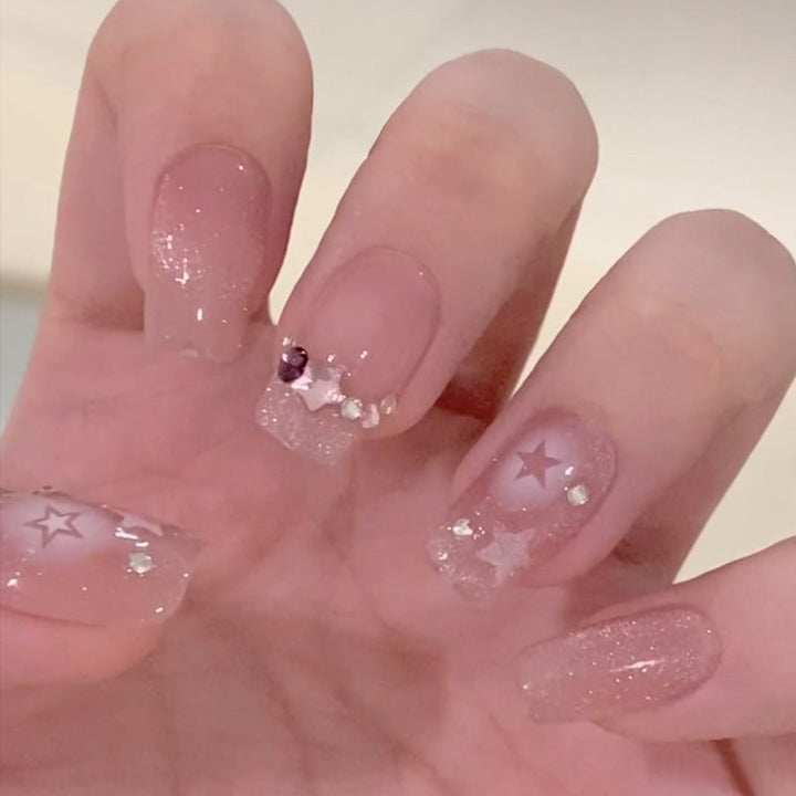 Glittering artificial nails with moon and star motifs Kalsten