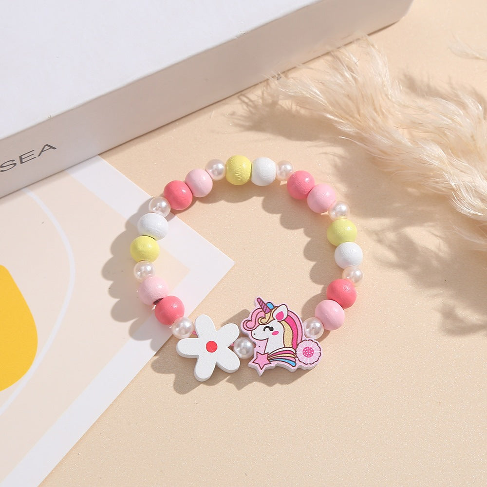 Playful children's bracelet with unicorn and flower motif Kalsten