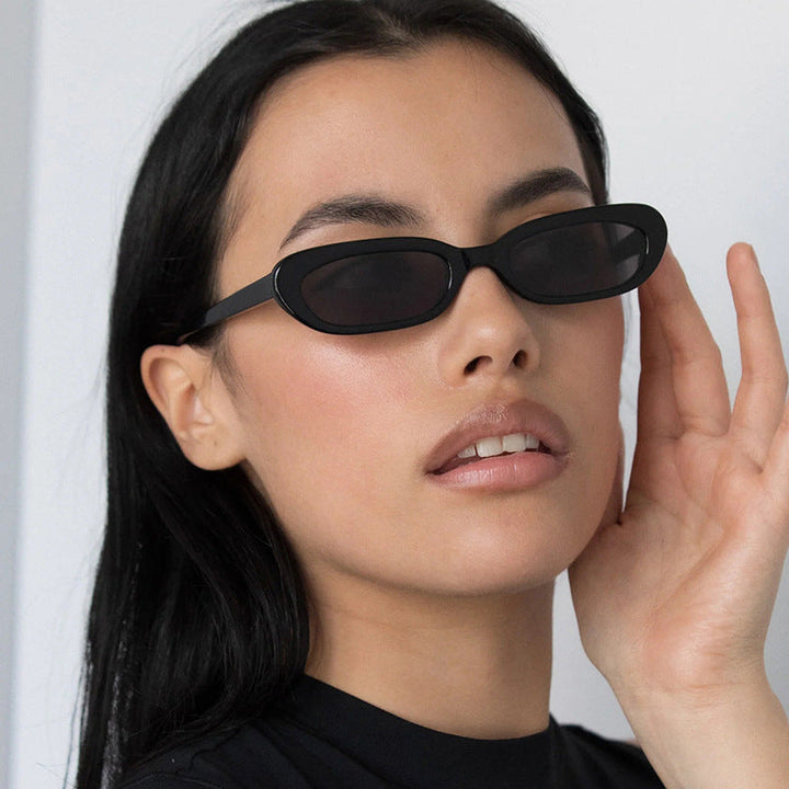 Women's trendy cat-eye sunglasses with transparent plastic frame and UV protection Kalsten