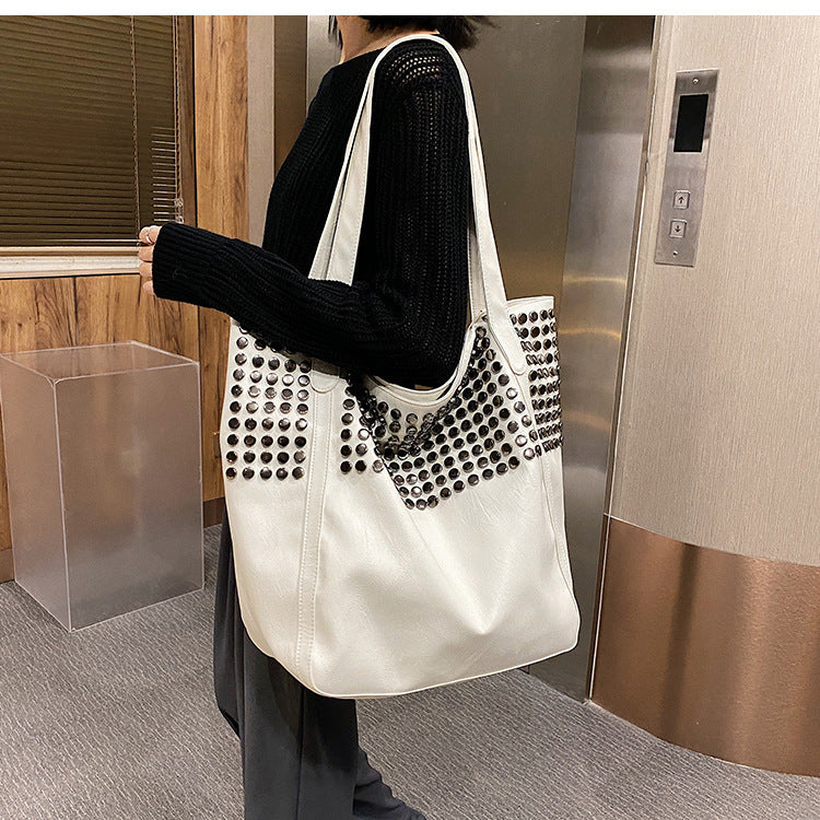 Fashionable shoulder bag with stylish rivet details Kalsten