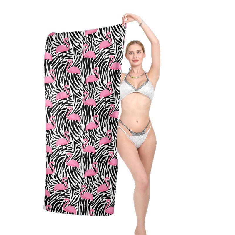 Beach towel with vibrant flamingo pattern and geometric design Kalsten