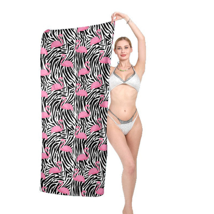 Beach towel with vibrant flamingo pattern and geometric design Kalsten