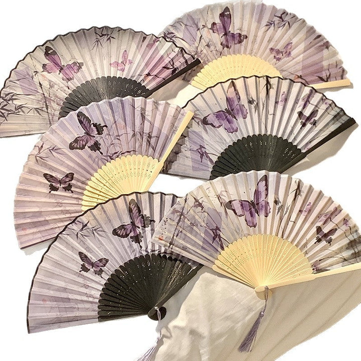 Elegant fan with elaborate butterfly motif Kalsten