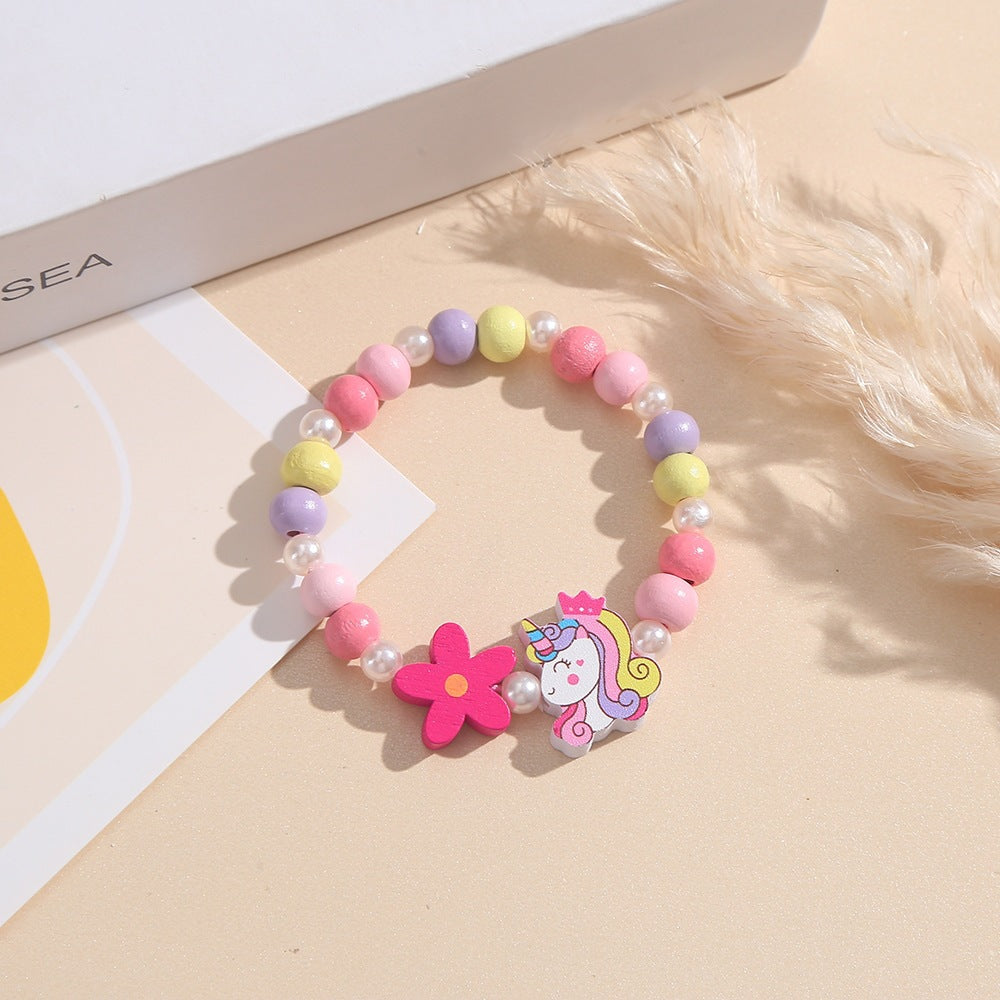 Playful children's bracelet with unicorn and flower motif Kalsten