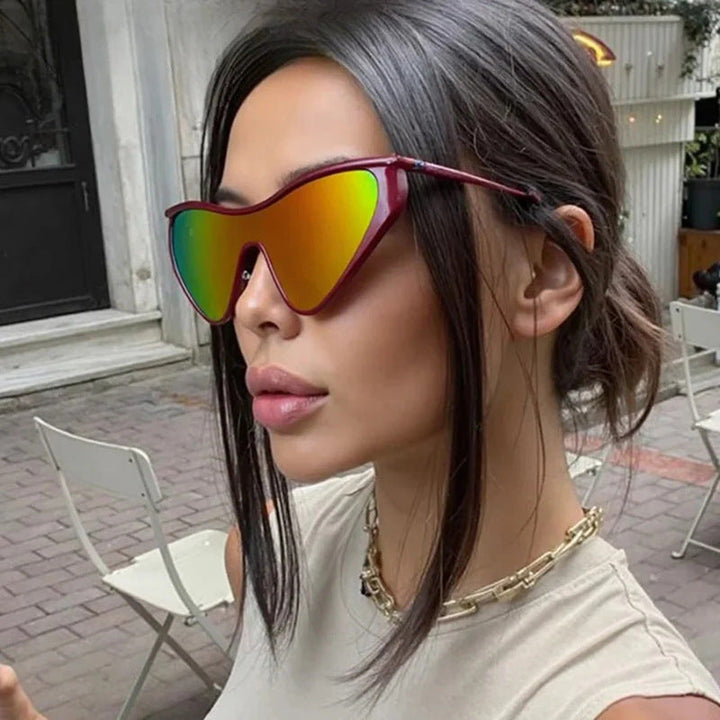 Ladies extravagant shaped sunglasses with protective UV filter Kalsten