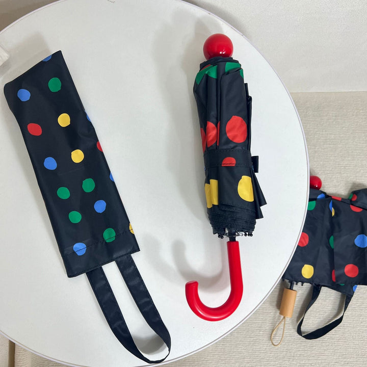 Ladies designer foldable umbrella with colorful polka dot pattern Kalsten