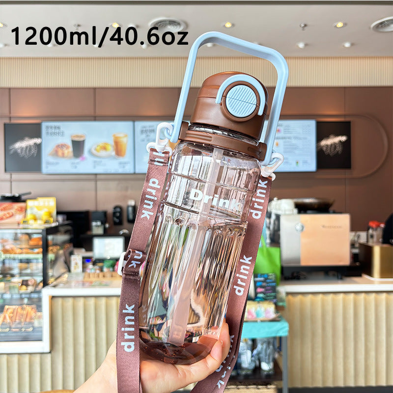 Women's large transparent drinking bottle with integrated carrying handle Kalsten