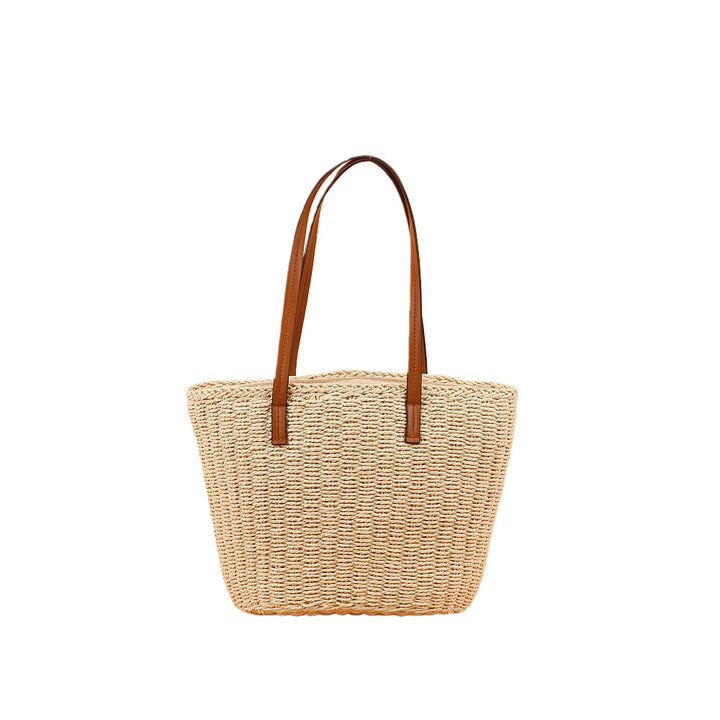 Handbag made of hand-woven natural material with sturdy leather handles Kalsten