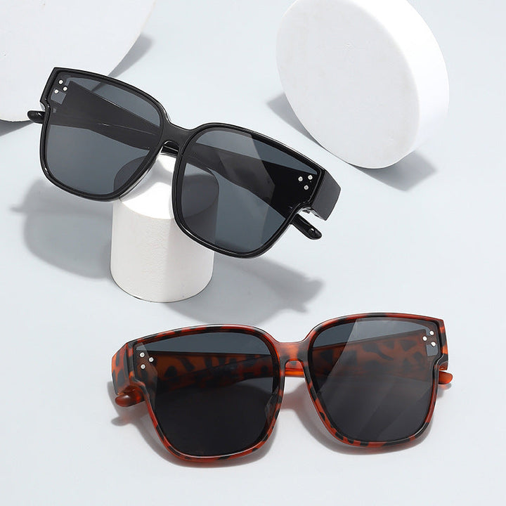 Ladies Fashion Sunglasses in clear lines design with high UV protection Kalsten