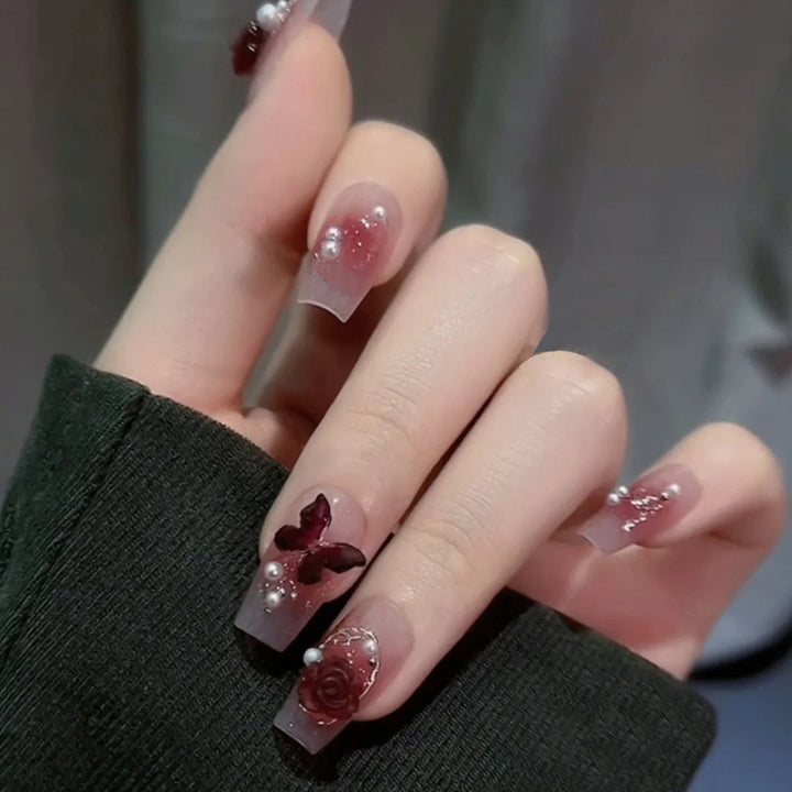 Glamorous artificial fingernails with glitter and moon designs Kalsten