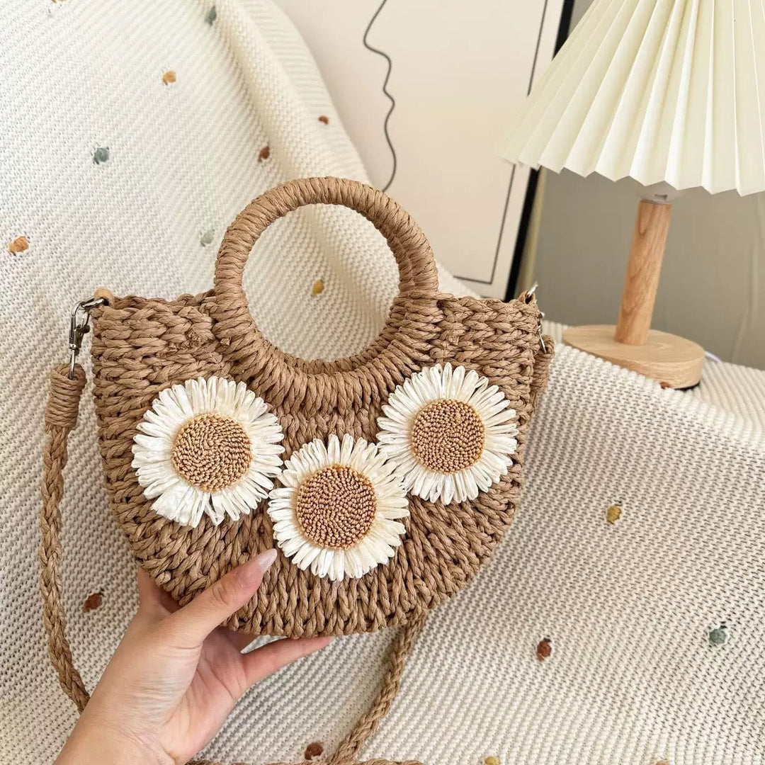Handbag made of natural material with floral accents Kalsten