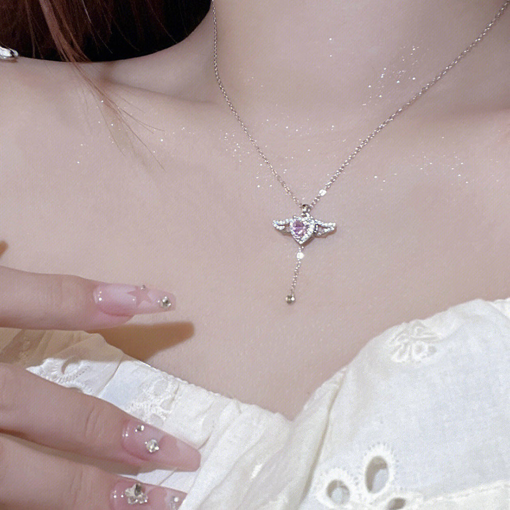 Playful angel neck chain with heart and wings Kalsten