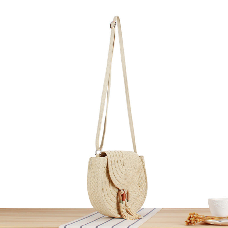 Round Bast Crossbody Bag with Tassels by Kalsten