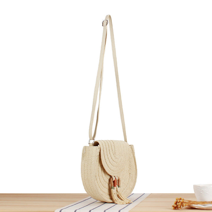 Round Bast Crossbody Bag with Tassels by Kalsten