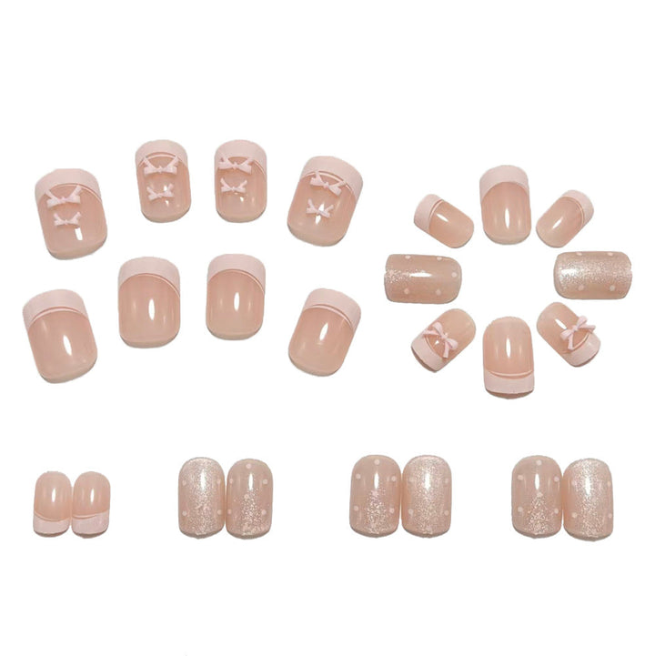 Artificial nails with delicate bows and glitter accents Kalsten