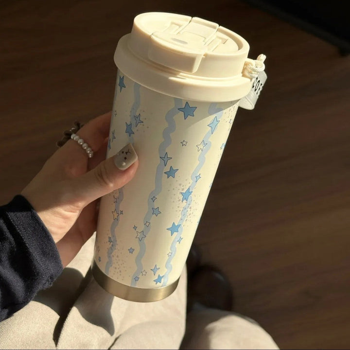 Women's insulated mug with practical carrying handle and charming Hello Kitty design Kalsten