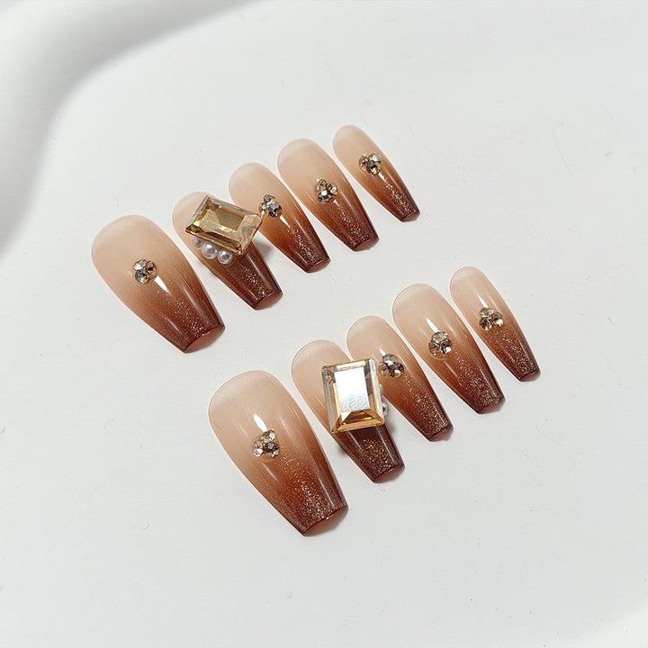 Artificial nails with elegant ombre effect and exquisite gemstones Kalsten