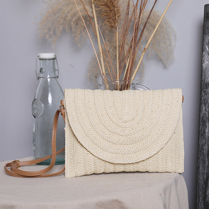 Handbag Made of High-Quality Woven Straw with Elegant Flap Closure Kalsten