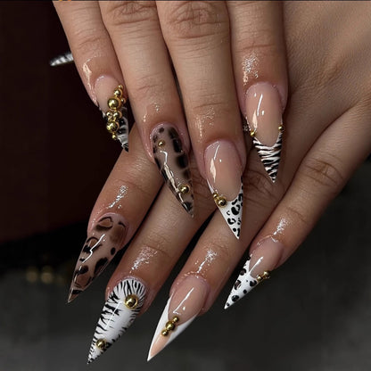 Artificial nails in a playful flower design with glittering accents Acalora