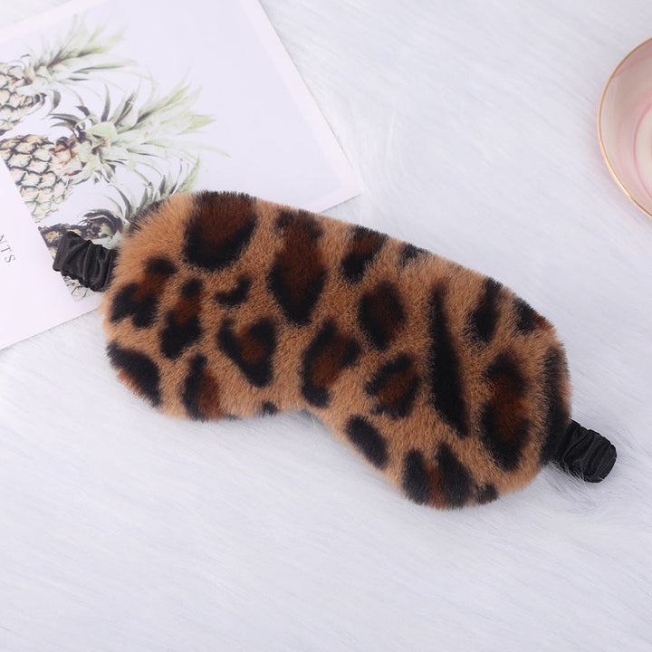 Women's cuddly faux fur sleep mask with heart-embossed surface and gathered comfort band Kalsten