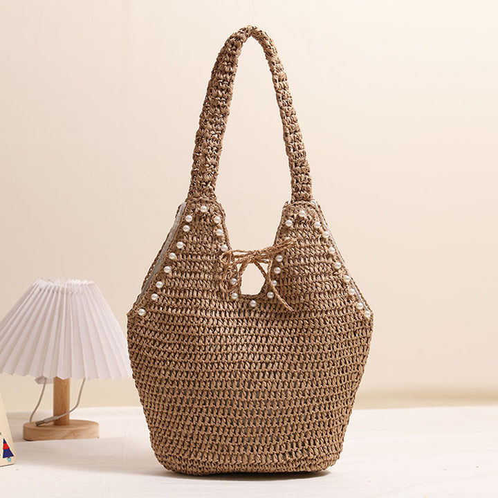 Handbag with pearl decor and innovative closure Kalsten